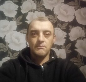 Николай