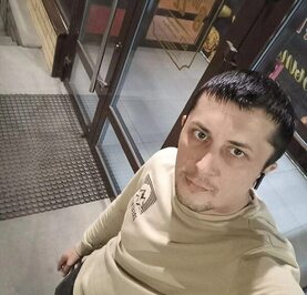 Николай